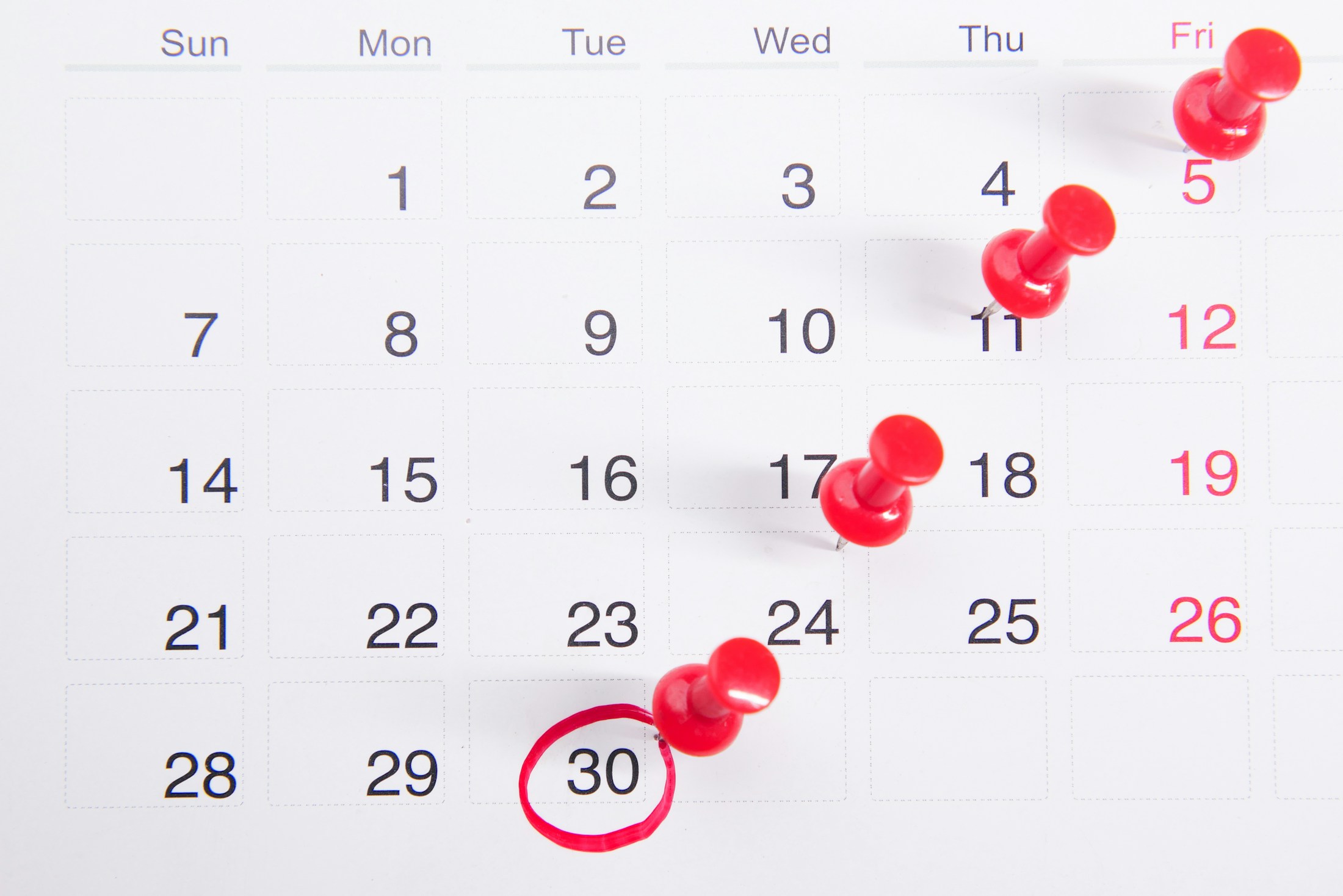 Symbolbild Vier-Tage-Woche, Kalender mit markierten Terminen